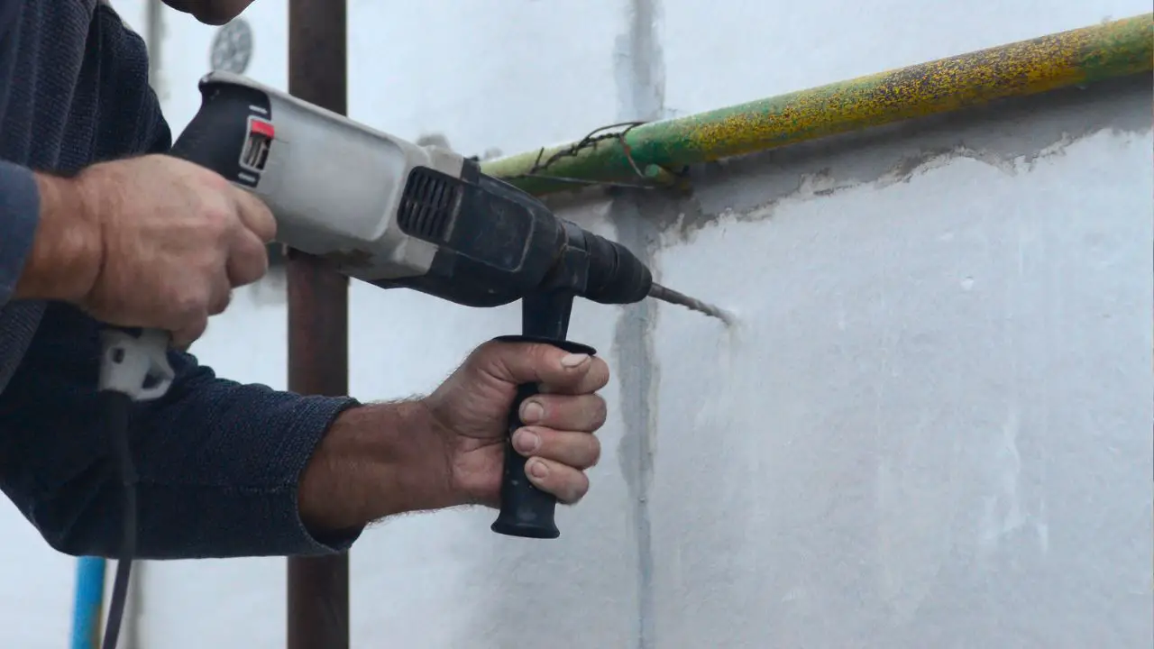how to drill into plaster walls